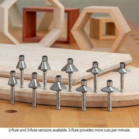 Pro Grade Badass Chamfer Router Bit Five Piece Set With One Quarter Inch Shank And Three Flute Twin Pilot Bearing Carbide Tips on wood.
