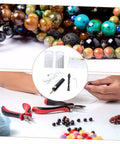 Mini Electric Drill Set For Jewelry Making And Crafting With USB Powered Mini Drill Twist Bits And PCB Accessories shown with beads.