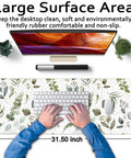 Top view of large Green Speckled Boho Mouse Pad Desk Mat With Non Slip Rubber Base, Stitched Edges, 31.5x11.75 Inches.