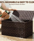 Massive Wicker Storage Basket With Lid, 104 Liter Rattan Blanket Box being washed with water.
