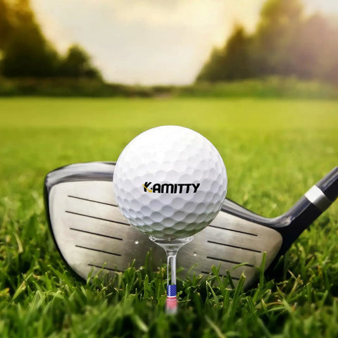 Golf ball on Unbreakable Plastic Golf Tee Three And A Quarter Inch with USA Flag design on grass.