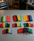 Massive 164 Piece Heat Shrink Tubing Kit With Polyolefin Wire Sleeves Electric Insulation In 5 Vibrant Colors Perfect For All Your Wiring Repairs And Diy Electrical Projects To Keep Your Connections Safe And Secure, assorted sizes laid out