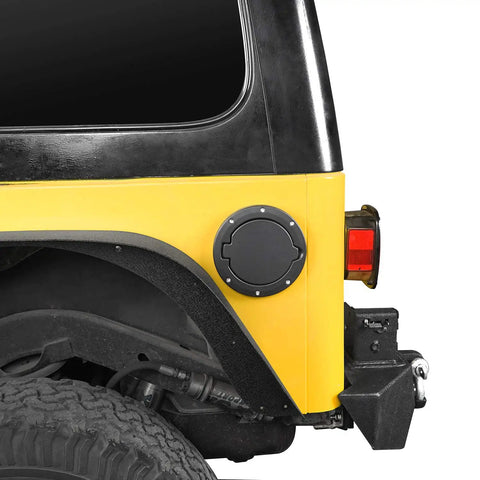 Fuel Filler Door Cover For Jeep Wrangler TJ 1997 To 2006, Black Finish, Non Locking Gas Tank Shield installed on yellow Jeep