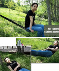 Army Green Outdoor Travel Hammock With Mesh Net Nylon Rope Construction shown in use outdoors.