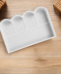 White plastic Garden Fence Concrete Mold For DIY Projects Reusable Plastic Cement Brick Mold For Courtyard Rail Patio Sidewalk Lawn Edging 17.32x11.69 Inch Form Kit on wooden surface.