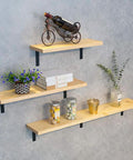 Upgraded Storage Solutions With These Heavy Duty Industrial L Brackets For Floating Shelves solid metal corner supports holding decorative items.
