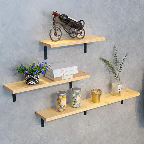 Upgraded Storage Solutions With These Heavy Duty Industrial L Brackets For Floating Shelves solid metal corner supports holding decorative items.