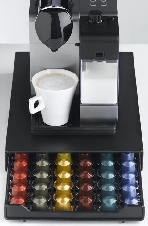 Keep Your Kitchen Game Tight With This Metal Coffee Pod Drawer Holds Sixty Nespresso Capsules Effortless Slide Design Lets You Snag Pods Without Breaking A Sweat, featuring a coffee maker and a white cup on the drawer.