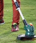Person using a grass trimmer with a plastic cutter head from the 60 Pack String Trimmer Blades Replacement Set for Weed Eater Wacker Blades with Universal Fit.
