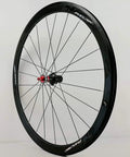700C Road Bike Wheelset With Carbon Fiber Hub And 40mm Matte Aluminum Rim, front view with red hub, stainless steel spokes visible