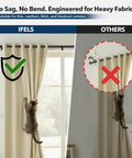 Comparison of heavy duty black curtain rod for windows, shows strength supporting a curtain with a climbing cat