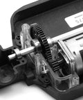 Close-up of CHRCOED hardened steel 14T pinion gear on 2.0mm shaft bore in RC car transmission housing.