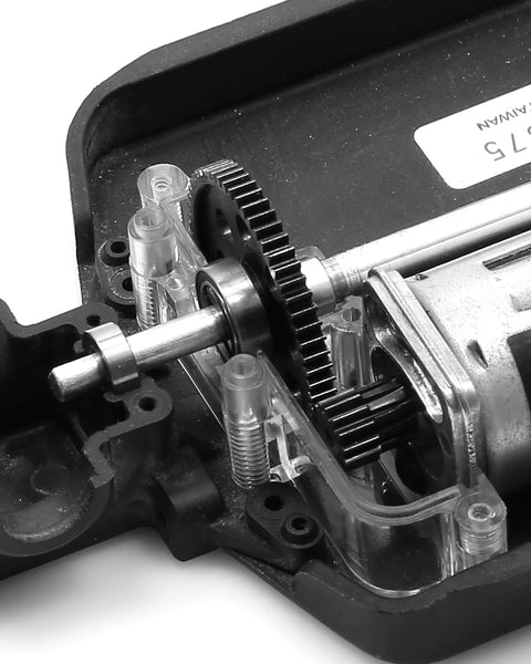 Close-up of CHRCOED hardened steel 14T pinion gear on 2.0mm shaft bore in RC car transmission housing.