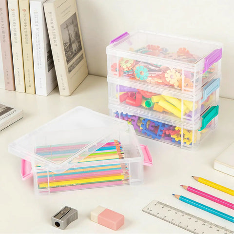 Big Ol Extra Large Clear Pencil Box For Crayons, Markers, And Art Supplies next to stacked organizer with secure lid