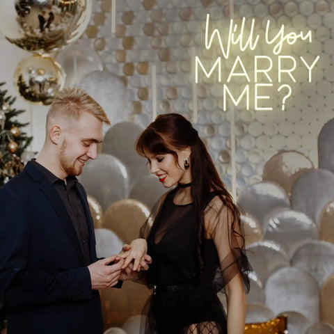 Couple with Will You Marry Me Neon Sign LED Proposal Light With Acrylic Backboard Large Marry Me Decor in background