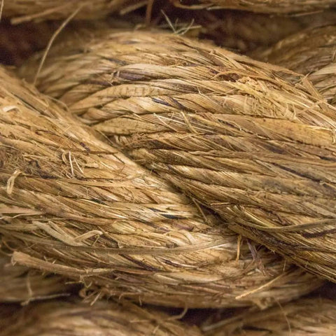 Close-up of three strand tan three eighths inch natural fiber manila rope roll, six hundred feet long for hauling and outdoor projects.