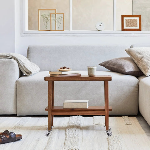 Wooden side table with Mini 1 Inch Swivel Threaded Stem Casters M6x15mm TPE Quiet Wheels in living room setting.