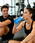 Woman drinking from foldable soft water bottle that is leakproof and packable for travel hikes and camping ultra flexible