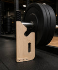 Barbell Plate Lifter Deadlift Jack Plate Loader Tool For Quick Plate Changes, with wooden EVA structure in gym setup, teal.