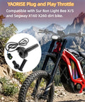 Full Twist Throttle Upgrade For Surron Electric Dirt Bike Waterproof E Bike Throttle Grips Kit shown with bike in mountains.