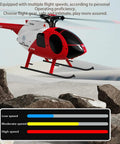 MD500 RC Helicopter Model C189 1/28 Scale 4CH Single Rotor With 6-Axis Gyro, flying over rocky terrain, red and white finish.