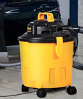 Five Gallon Wet Dry Shop Vacuum 60 CFM 6 HP Peak Power Beast Suction Portable 3 In 1 with Filter Hose beside car in garage
