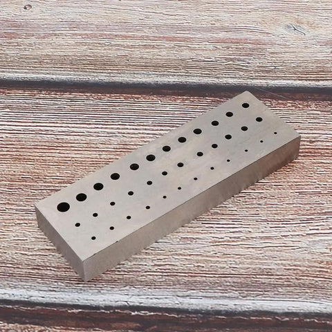 Heavy Duty Watch Staking Tool With Metal Plate 36 Holes Riveting Stake Set adjustable hole sizes on wooden surface