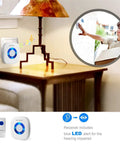 Waterproof Wireless Doorbell Kit with blue LED receiver and push button in home setting.