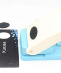 Oval Scrapbooking Punch For Paper Crafting One Inch 25mm Lever Embossing Punch shown with punched oval and sample card