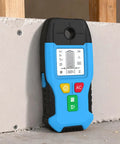 6-in-1 Stud Finder Wall Scanner Metal Detector Auto Shutoff LCD(Blue) resting against drywall with buttons visible.