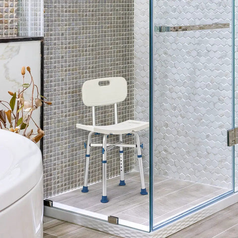 Shower Chair With Back Support, 500Lb Heavy Duty Silver Aluminum Bath Seat inside a glass shower enclosure