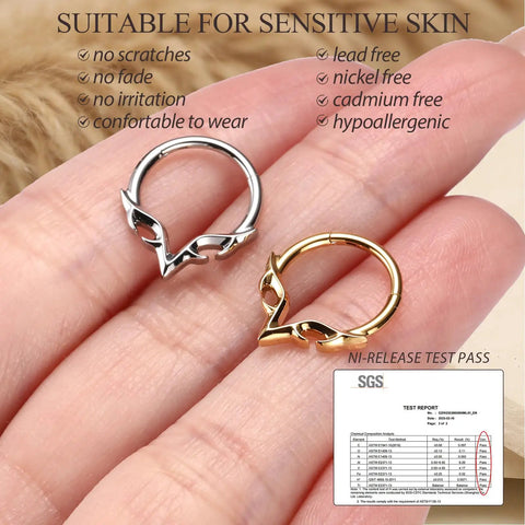 Two septum rings in hand, gold and silver. Gold Blade Wings V Shape Septum Ring 16G 1.2mm Stainless Steel Nose Hoop 8mm.