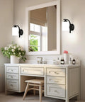 Top Tier Modern Farmhouse Wall Sconces With Solid Matte Black Frame And Soft Diffused Glass Shade Hardwired Vanity Light Fixture by mirror in bathroom.