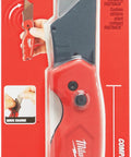 Red Fastback Compact Folding Utility Knife With Quick Change Blade System in packaging, showing lanyard hole and belt clip.