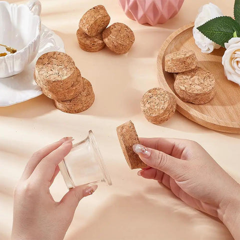 Hands holding Two Size Wood Cork Plugs 10 Pack Large Tapered Wooden Stoppers For Wine Beer And Glass Bottles Ornaments DIY