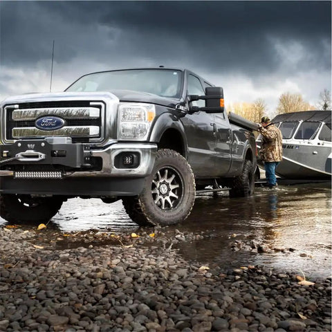 Truck with Standard Manual Locking Hubs for 30-Spline Axles, Chrome and Black Finish, Heavy Duty 4WD Hubs Pair in off-road setting