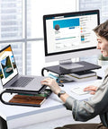 Person using Desktop Monitor Stand With Dope Ventilated Perforated Steel Design as laptop shelf and desk organizer in office setting.