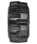 Close-up of tread pattern on Belted 2.8 Inch Sand Paw HP Paddle Tires On Raid Black 6x30 Wheels For Sand Drag Racing