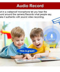 Two boys engaging with a colorful book, demonstrating audio recording features with a microphone icon.