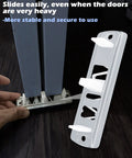 Sliding Closet Door Floor Guide Kit 8 Pack With Stamped Steel Base And Adjustable White Nylon Tips Fits Doors 3/4 To 1-3/8 Inch Durable Construction Easy Install Compatible With Prime-Line N 6560 White shown installed under doors