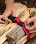 Hands adjusting Beefy Outdoor Nylon Luggage Straps With Quick Release Buckle 1.5m Heavy Duty Camping Tie Down Straps