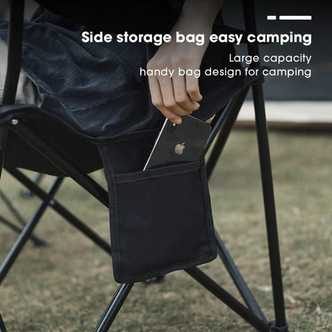 Person placing phone into side storage of Four Pack Folding Camping Chairs Weigh Just Four Pounds, Ultra Portable With Carry Bag