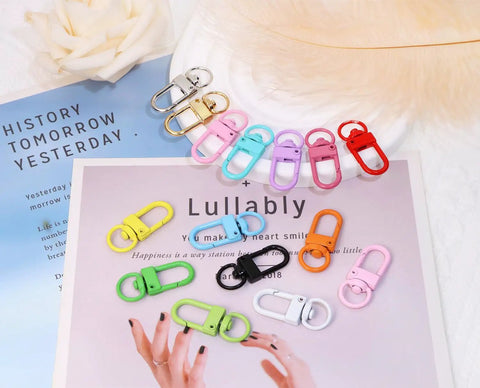 Forty Five Piece Rock Solid Metal Lobster Claw Clamps With Dope Mixed Color Combo Three Two Millimeter Slick Swivel Snap Hooks.