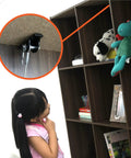 Child looking at bookshelf secured with Anti Tip Furniture Anchors For Dresser, Bookshelf And Cabinet Safety, Heavy Duty Wall Straps Kit