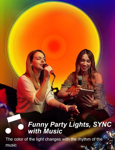 Two women singing karaoke with Sunset Projection Lamp With 64 Color Options, App Controlled Ambient Light With Ivy Leaves