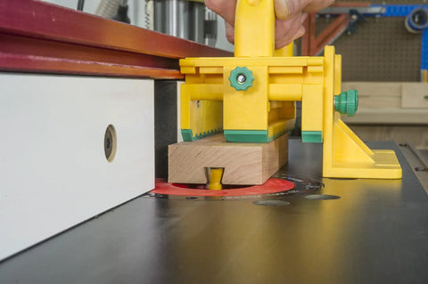 Matchfit Dovetail Router Bit for Dovetail Clamp System 14 Degree Half Inch Profile cutting wood on a table for smoother grooves