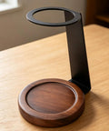 Kickstart Your Morning Routine With This Top Shelf Pour Over Coffee Dripper Stand, Smooth Operator Aluminum And Genuine Wood Filter Holder Rack, sleek black and wood design. 