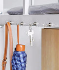 Heavy Duty Magnetic Hooks Set With 85lb Capacity holding umbrella and keys on metal frame.