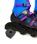 Black 2 Pack Roller Skate Toe Stops And Brake Pads Non Slip Rubber Quad Skate Braking Blocks next to blue inline skate
