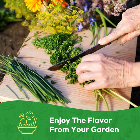 Person chopping herbs with knife on wooden board, representing 10 Herb Seeds Variety Pack With Over 7000 Heirloom Non GMO Seeds